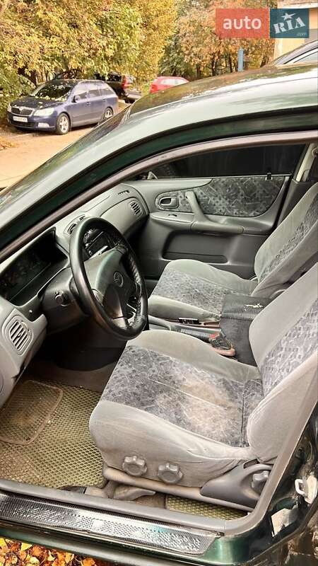 Хетчбек Mazda 323 1999 в Києві фото 12 Хетчбек Mazda 323 1999 в Києві