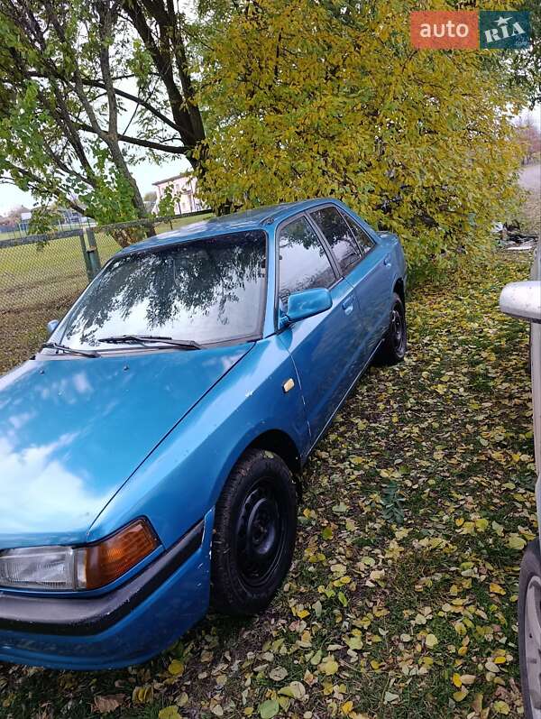 Седан Mazda 323 1995 в Сумах