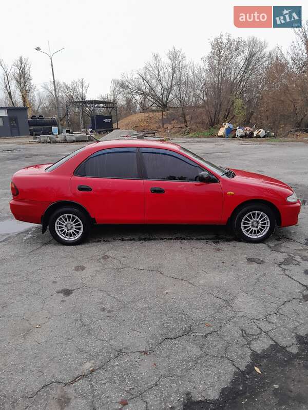 Седан Mazda 323 1996 в Синельниково фото 2 Седан Mazda 323 1996 в Синельниково