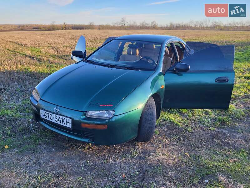 Хэтчбек Mazda 323 1998 в Подольске фото 15 Хэтчбек Mazda 323 1998 в Подольске