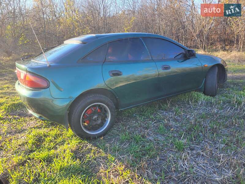 Хэтчбек Mazda 323 1998 в Подольске фото 16 Хэтчбек Mazda 323 1998 в Подольске