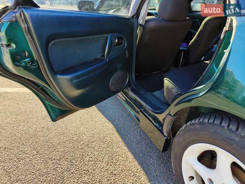 Хэтчбек Mazda 323 1994 в Николаеве фото 33 Хэтчбек Mazda 323 1994 в Николаеве