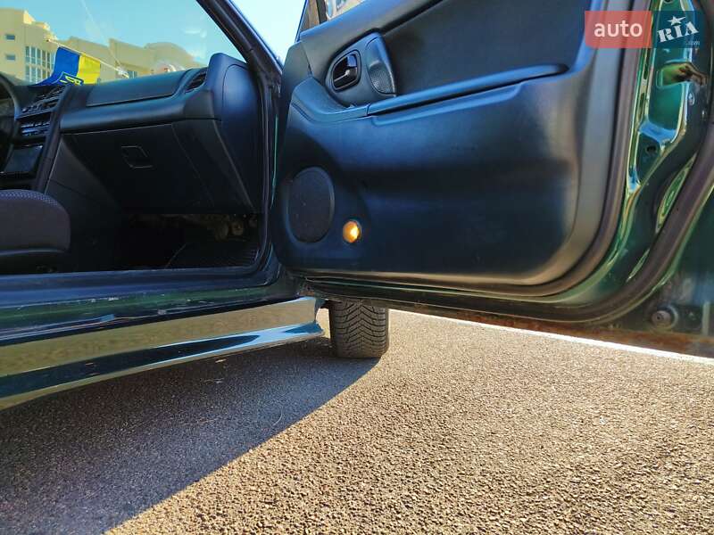 Хэтчбек Mazda 323 1994 в Николаеве фото 55 Хэтчбек Mazda 323 1994 в Николаеве