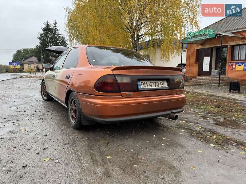 Седан Mazda 323 1997 в Сумах фото 3 Седан Mazda 323 1997 в Сумах