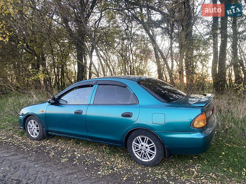 Седан Mazda 323 1998 в Одесі фото 29 Седан Mazda 323 1998 в Одесі