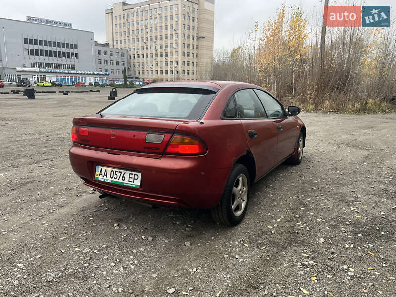Хэтчбек Mazda 323 1994 в Вышгороде фото 5 Хэтчбек Mazda 323 1994 в Вышгороде