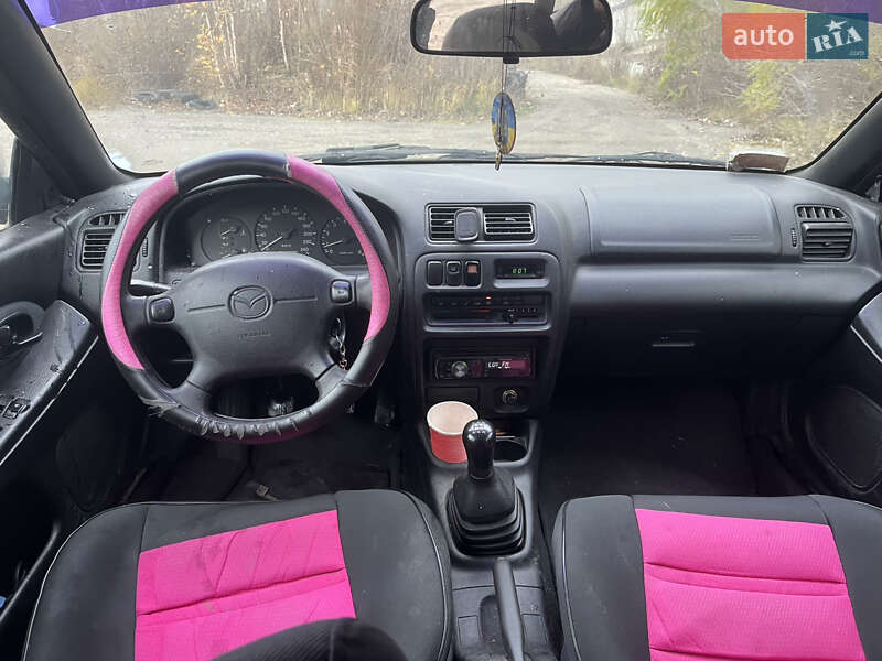 Хэтчбек Mazda 323 1994 в Вышгороде фото 16 Хэтчбек Mazda 323 1994 в Вышгороде