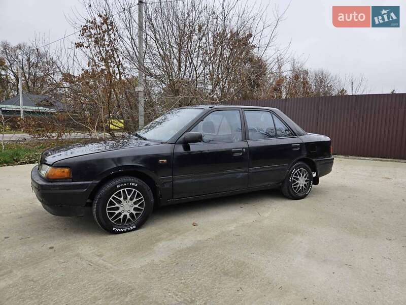 Седан Mazda 323 1995 в Обухове фото 11 Седан Mazda 323 1995 в Обухове