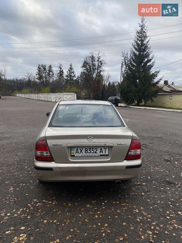 Седан Mazda 323 1999 в Харькове