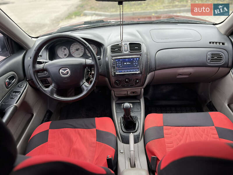 Седан Mazda 323 2002 в Дніпрі фото 7 Седан Mazda 323 2002 в Дніпрі