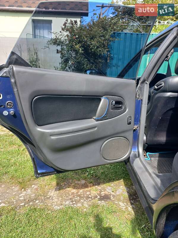 Хетчбек Mazda 323 1995 в Києві фото 18 Хетчбек Mazda 323 1995 в Києві