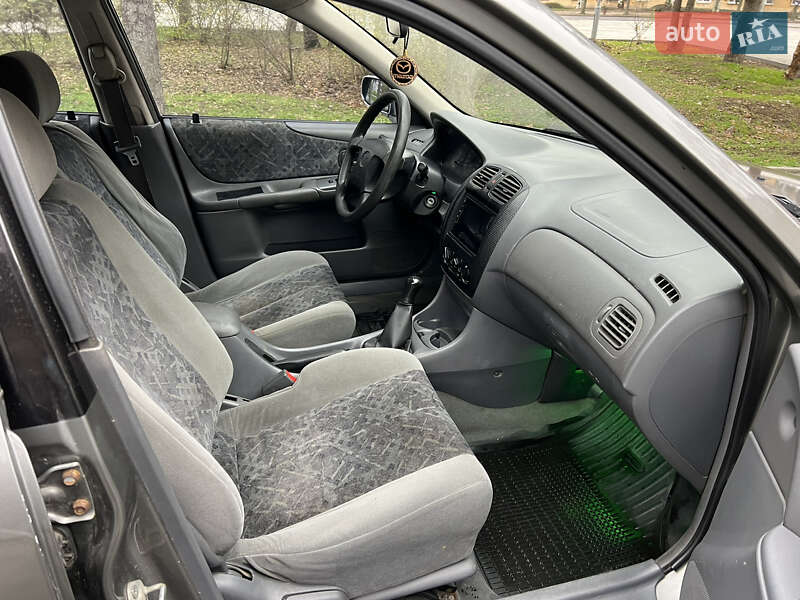 Хетчбек Mazda 323 1999 в Дніпрі фото 5 Хетчбек Mazda 323 1999 в Дніпрі