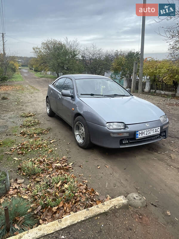 Хетчбек Mazda 323 1994 в Роздільній фото Хетчбек Mazda 323 1994 в Роздільній
