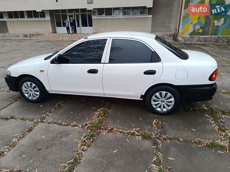 Седан Mazda 323 1998 в Чернівцях фото 14 Седан Mazda 323 1998 в Чернівцях