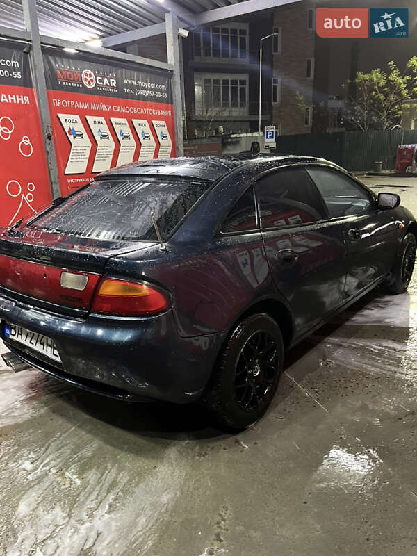 Хэтчбек Mazda 323 1997 в Киеве фото 4 Хэтчбек Mazda 323 1997 в Киеве