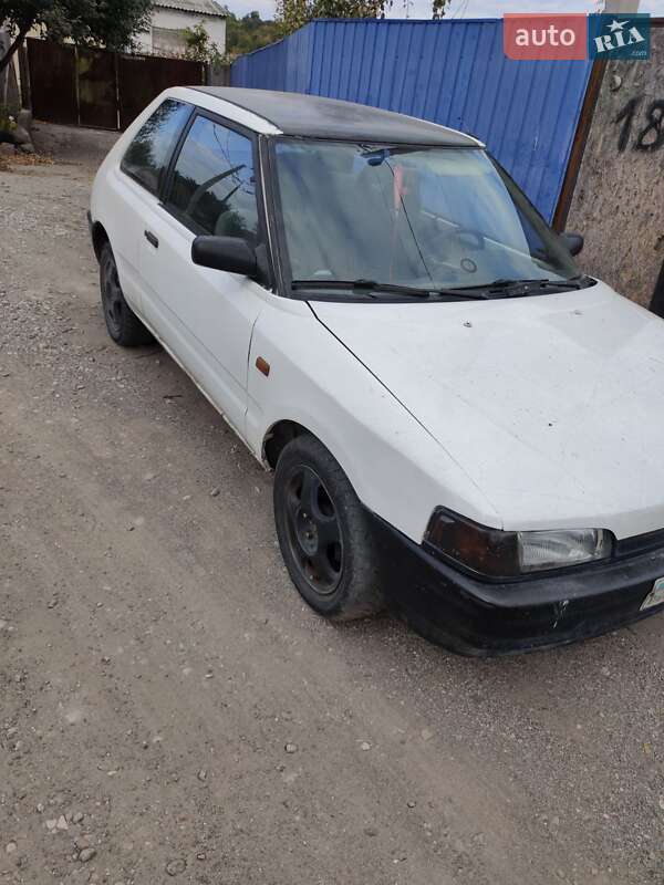Хэтчбек Mazda 323 1991 в Днепре фото 3 Хэтчбек Mazda 323 1991 в Днепре