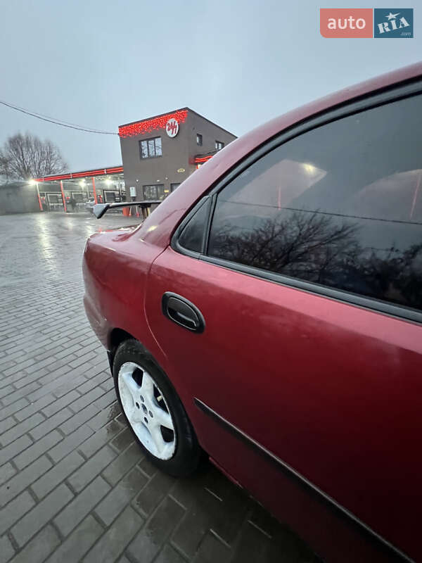 Седан Mazda 323 1996 в Рівному фото 12 Седан Mazda 323 1996 в Рівному