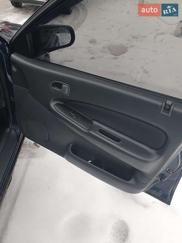 Седан Mazda 323 1998 в Киеве фото 6 Седан Mazda 323 1998 в Киеве