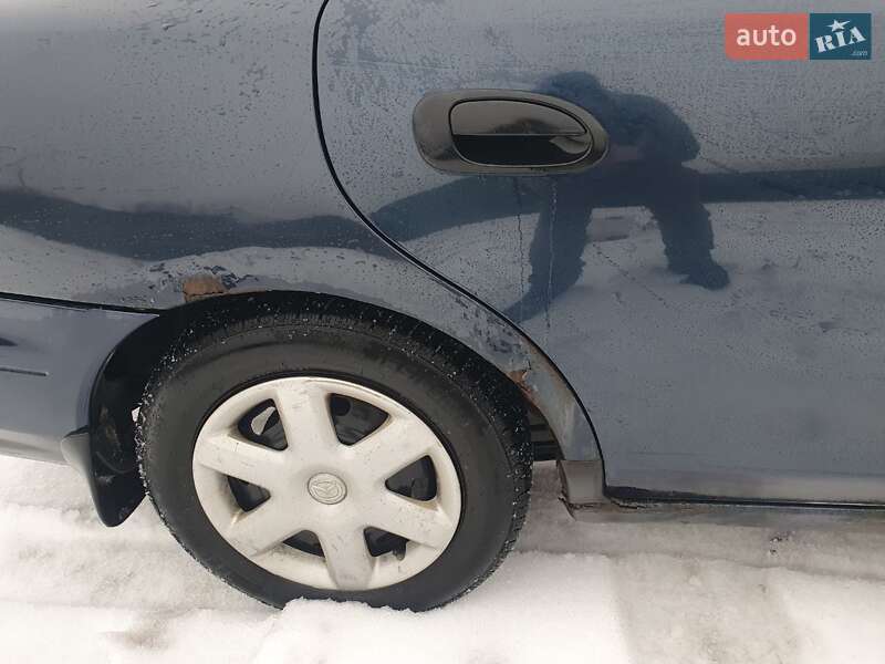 Седан Mazda 323 1998 в Киеве фото 16 Седан Mazda 323 1998 в Киеве