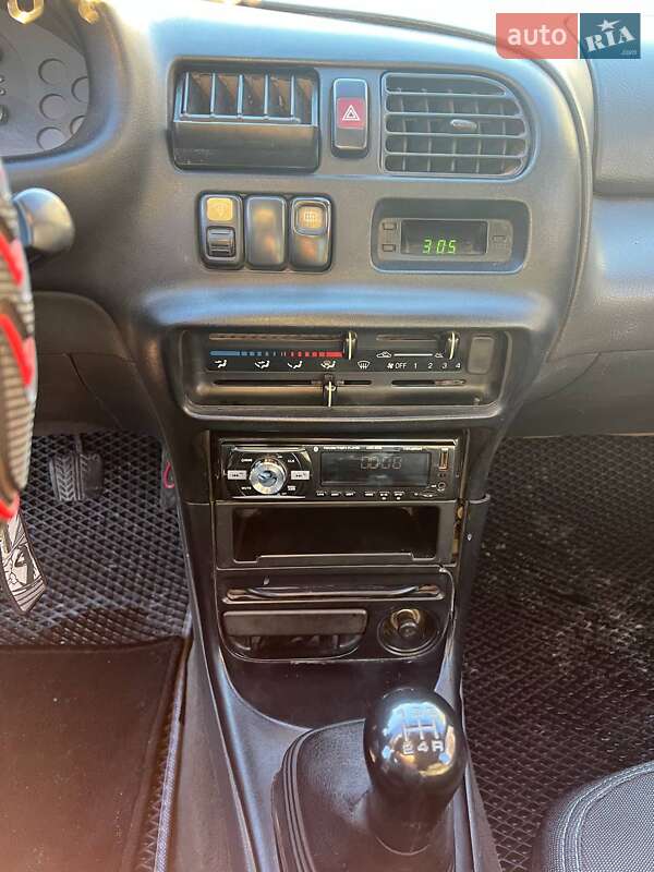 Хетчбек Mazda 323 1995 в Києві фото 13 Хетчбек Mazda 323 1995 в Києві