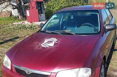 Седан Mazda 323 1999 в Ізюмі