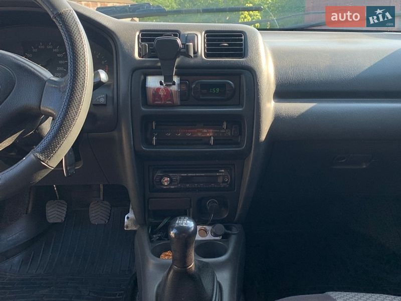 Седан Mazda 323 1997 в Полтаве фото 7 Седан Mazda 323 1997 в Полтаве