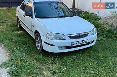 Седан Mazda 323 1999 в Хусте