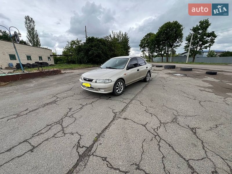 Седан Mazda 323 1997 в Нововолинську фото Седан Mazda 323 1997 в Нововолинську