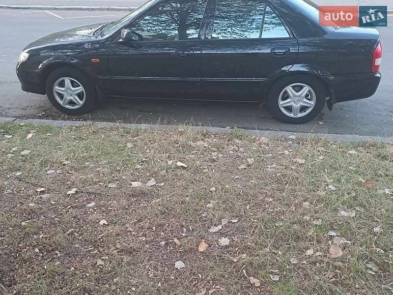 Седан Mazda 323 2003 в Києві фото 6 Седан Mazda 323 2003 в Києві