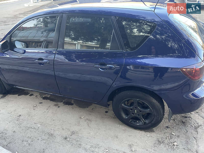 Хетчбек Mazda 3 2004 в Рені фото 4 Хетчбек Mazda 3 2004 в Рені