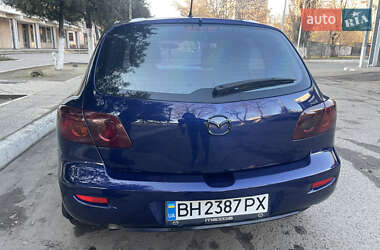Хетчбек Mazda 3 2004 в Рені фото 10 Хетчбек Mazda 3 2004 в Рені