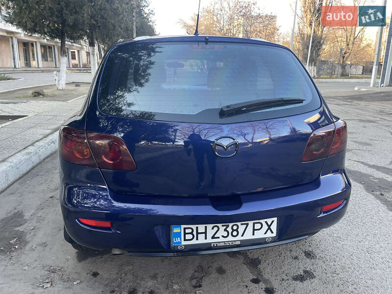 Хетчбек Mazda 3 2004 в Рені фото 10 Хетчбек Mazda 3 2004 в Рені