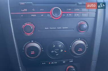 Хетчбек Mazda 3 2004 в Рені фото 11 Хетчбек Mazda 3 2004 в Рені