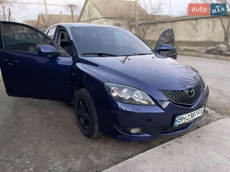 Хетчбек Mazda 3 2004 в Рені фото 14 Хетчбек Mazda 3 2004 в Рені