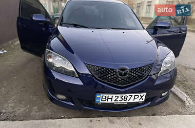 Хетчбек Mazda 3 2004 в Рені фото 13 Хетчбек Mazda 3 2004 в Рені