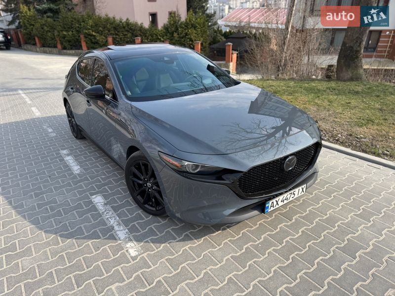 2019 Mazda 3 Premium, VIN JM1BPBNM4K1137077:plate — фото 1 (autoria)