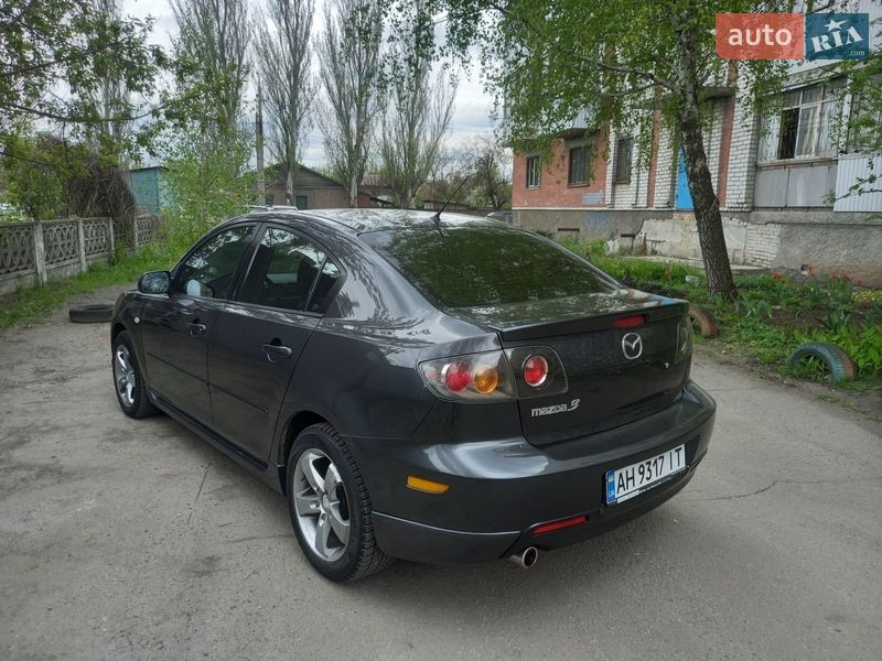 2005 Mazda 3, VIN JMZBK12F261353904:plate — фото 1 (autoria)