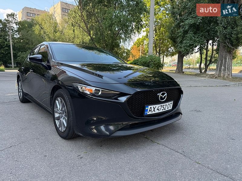Mazda 3, photos from the listing