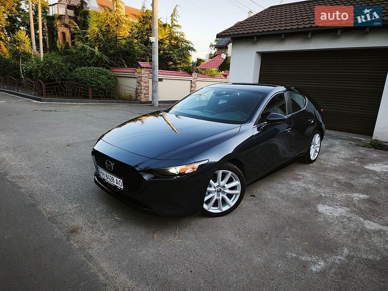 Mazda 3, photos from the listing