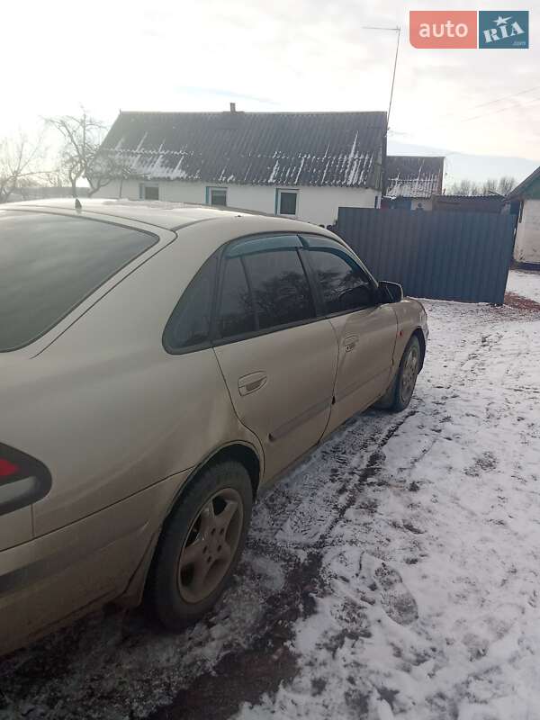 Хетчбек Mazda 626 1998 в Ємільчиному фото 5 Хетчбек Mazda 626 1998 в Ємільчиному