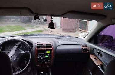 Хэтчбек Mazda 626 1998 в 