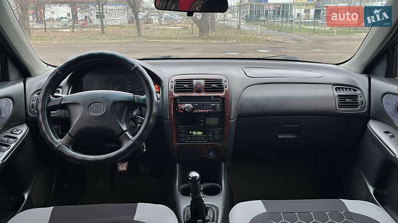 Хэтчбек Mazda 626 1998 в Николаеве фото 11 Хэтчбек Mazda 626 1998 в Николаеве