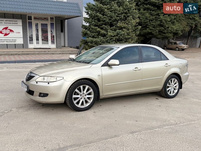 2005 Mazda 6, VIN JMZGG12F551295101:plate — фото 1 (autoria)