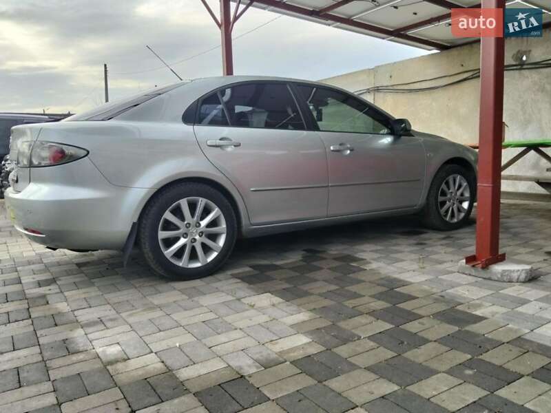 2006 Mazda 6, VIN JMZGG143771678995:plate — фото 1 (autoria)