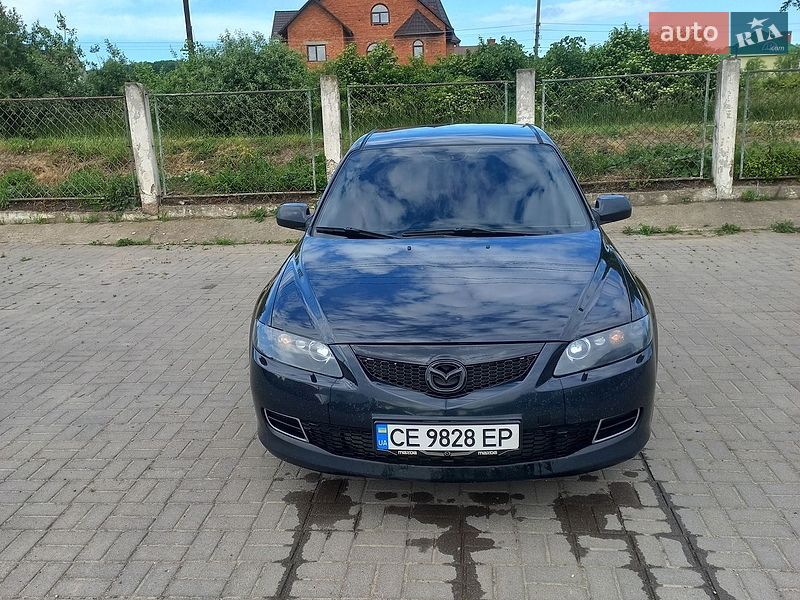 2007 Mazda 6, VIN JMZGG12F671694271:plate — фото 1 (autoria)