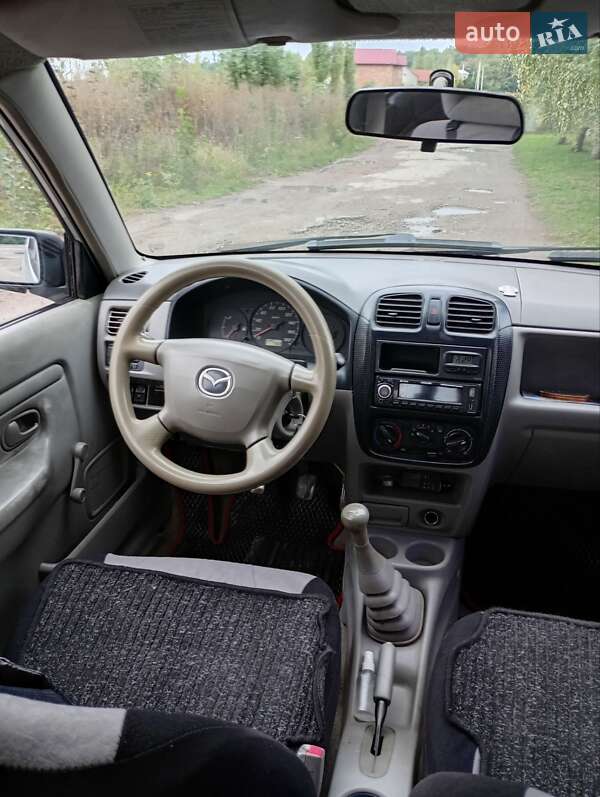 Хэтчбек Mazda Demio 2000 в Каменец-Подольском