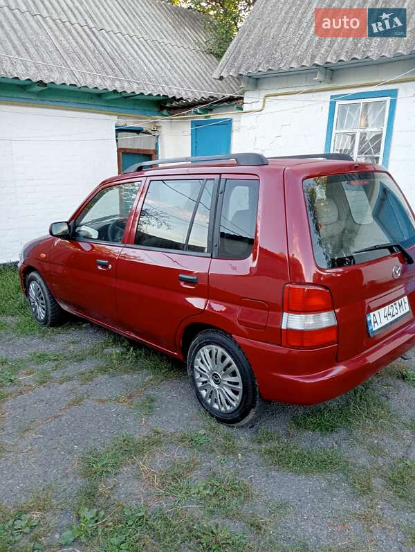 Хэтчбек Mazda Demio 1999 в 