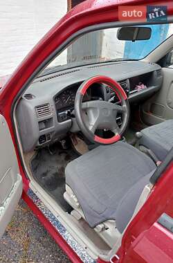 Хэтчбек Mazda Demio 1999 в 