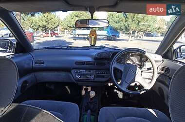Седан Mazda Persona 1989 в 