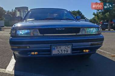 Седан Mazda Persona 1989 в 